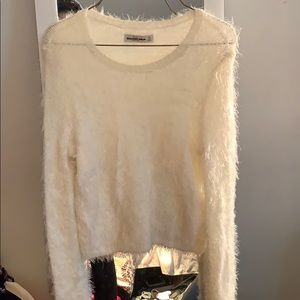 White fuzzy sweater